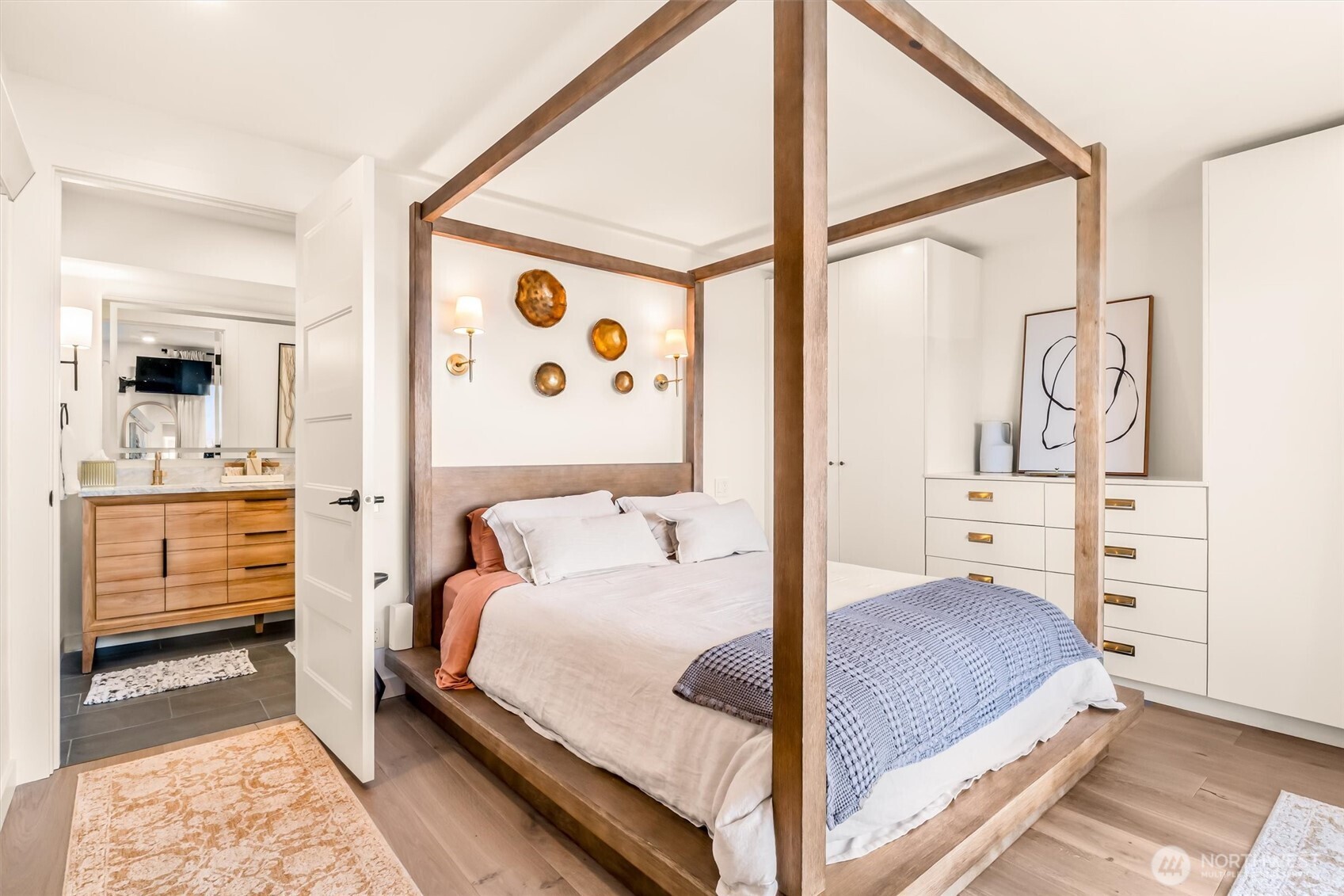 10203 47th Avenue Southwest, Unit D2 Seattle, WA 98146 - Photo 12 of 36 a bedroom with a large bed and a window