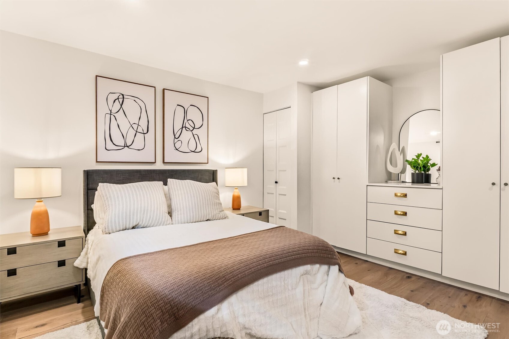 10203 47th Avenue Southwest, Unit D2 Seattle, WA 98146 - Photo 15 of 36 a bedroom with a bed and a dresser