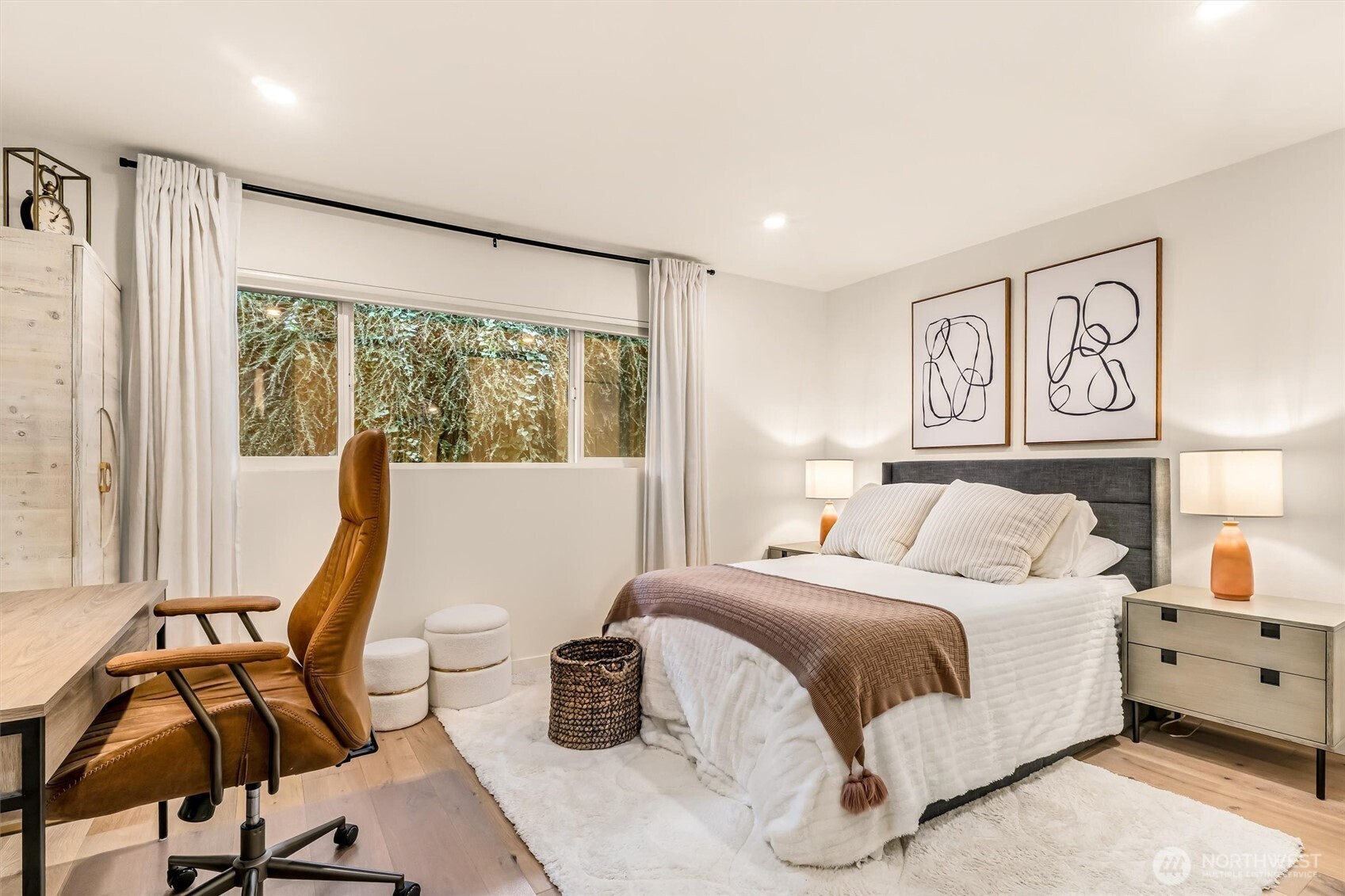 10203 47th Avenue Southwest, Unit D2 Seattle, WA 98146 - Photo 16 of 36 a bedroom with a bed chair and window