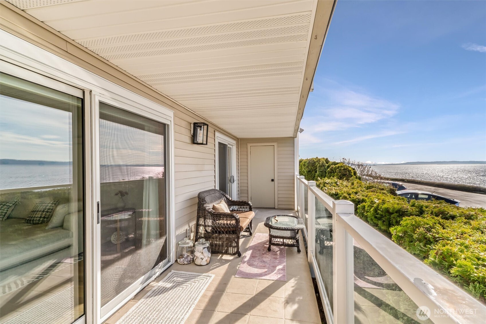 10203 47th Avenue Southwest, Unit D2 Seattle, WA 98146 - Photo 21 of 36 a view of a two chair in the balcony