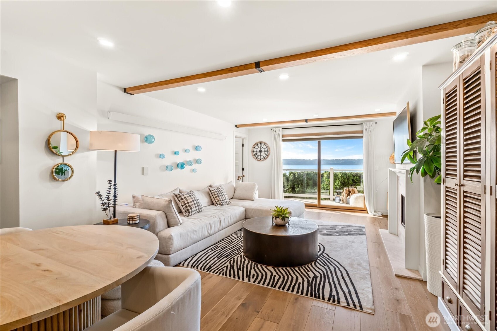 10203 47th Avenue Southwest, Unit D2 Seattle, WA 98146 - Photo 4 of 36 a living room with furniture and a large window