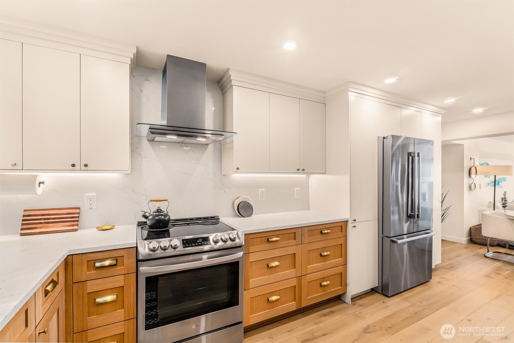 10203 47th Avenue Southwest, Unit D2 Seattle, WA 98146 - Photo 10 of 36 a kitchen with appliances cabinets and a window