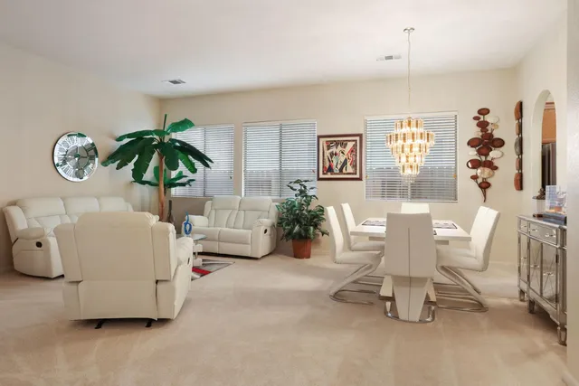 a view of a dining room with furniture