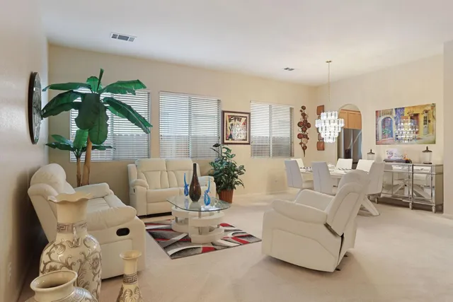 a bedroom with furniture and a bed