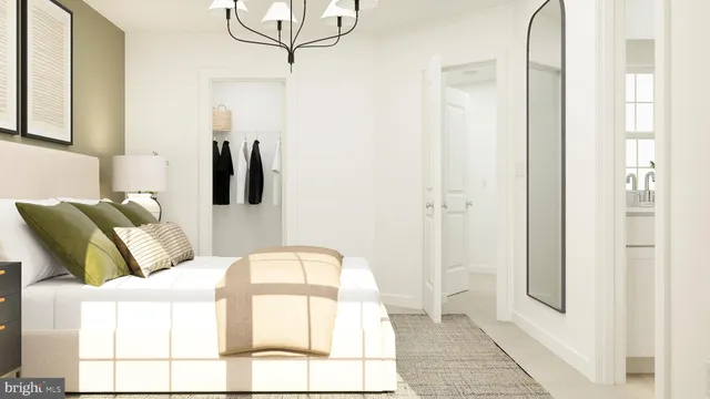 a bedroom with a bed and painting on the wall