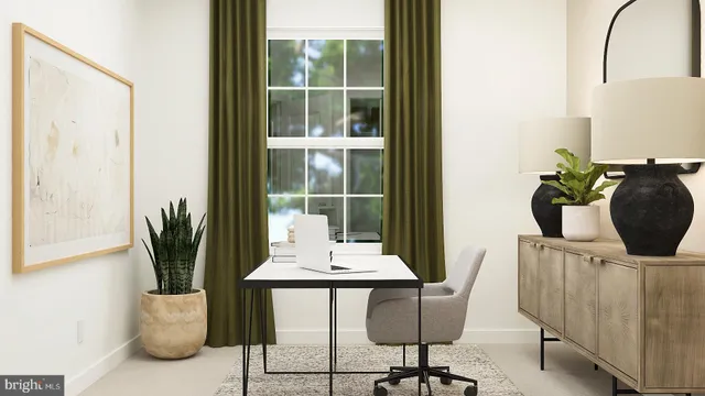 a view of a dining room with furniture and a potted plant