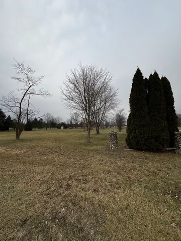 a black and white house with a outdoor space