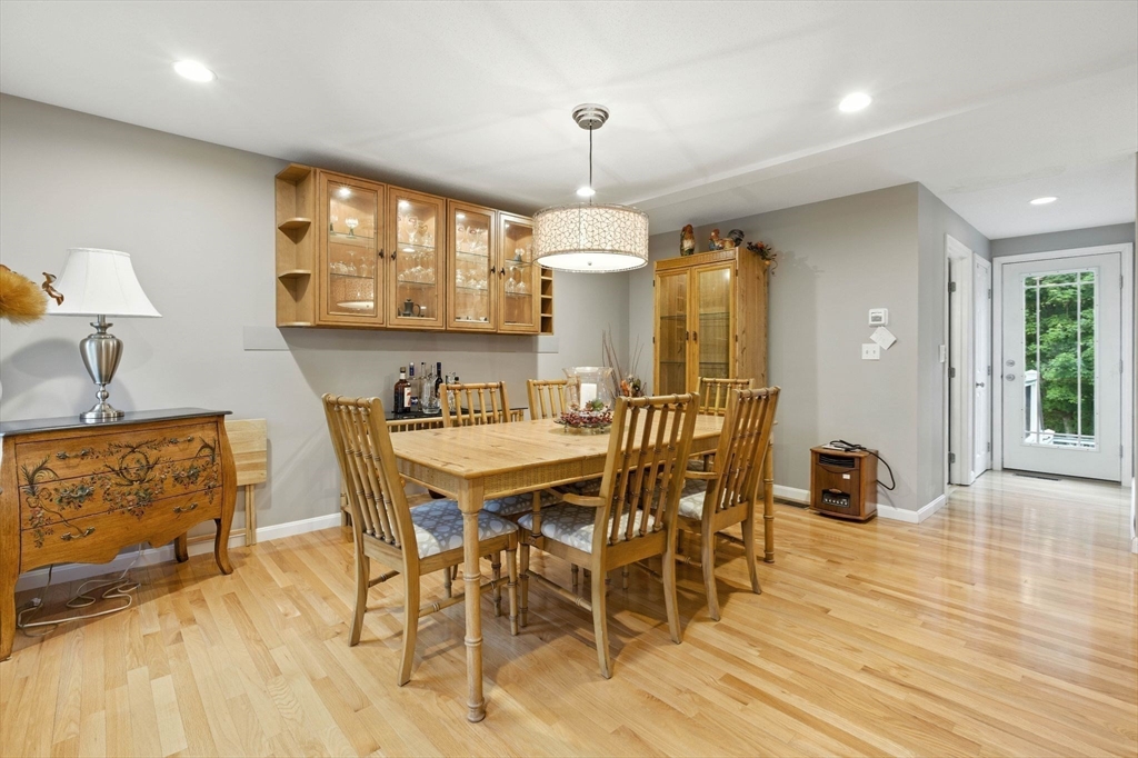 13 Colonial Drive Clinton, MA 01510 - Photo 20 of 42 a view of a dining room with furniture and wooden floor