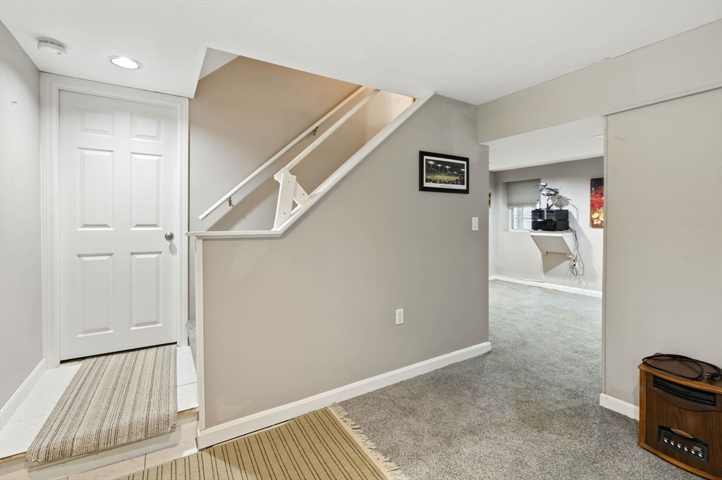 13 Colonial Drive Clinton, MA 01510 - Photo 30 of 42 a view of a hallway with workspace