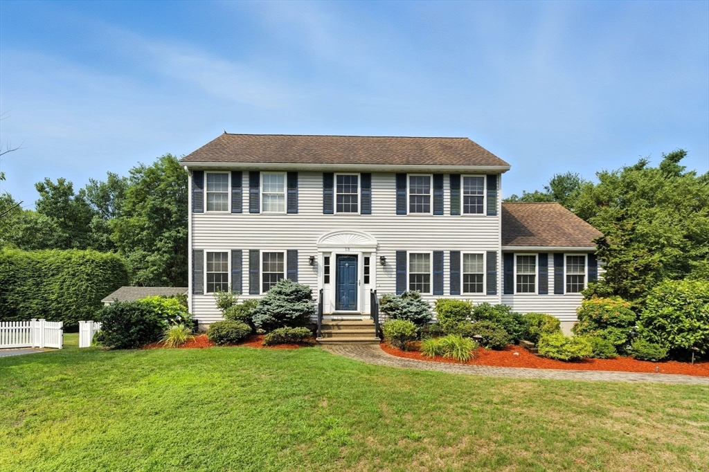13 Colonial Drive Clinton, MA 01510 - Photo 39 of 42 a front view of a house with a yard