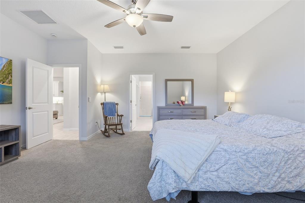 1271 Waterview Ridge Circle Apopka, FL 32703 - Photo 19 of 56 a bed room with a bed and a chair