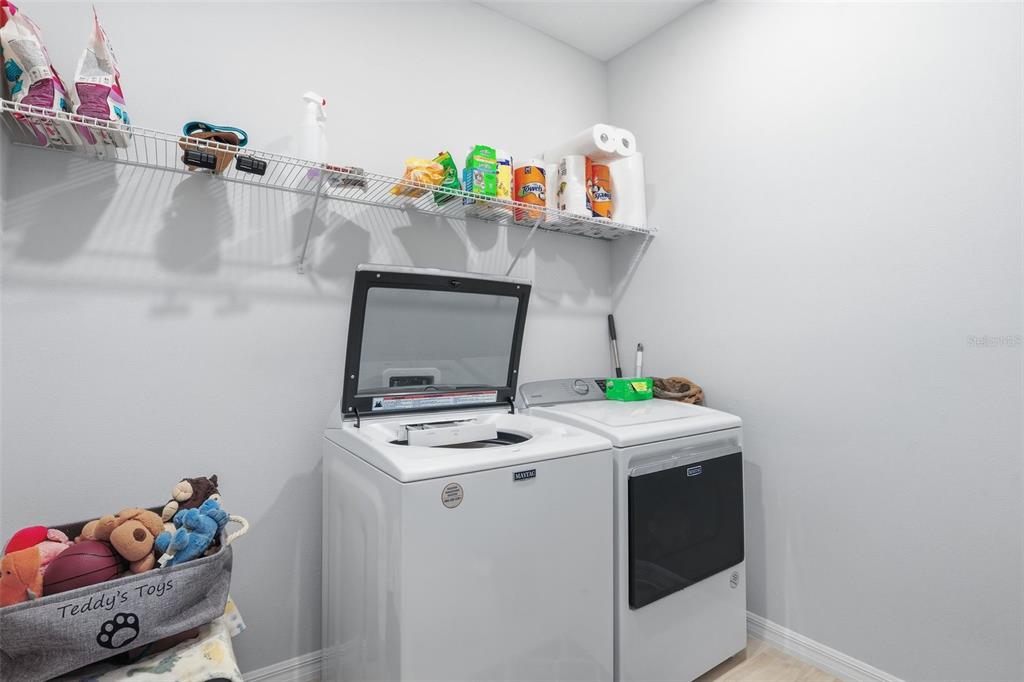 1271 Waterview Ridge Circle Apopka, FL 32703 - Photo 29 of 56 a utility room with dryer and washer