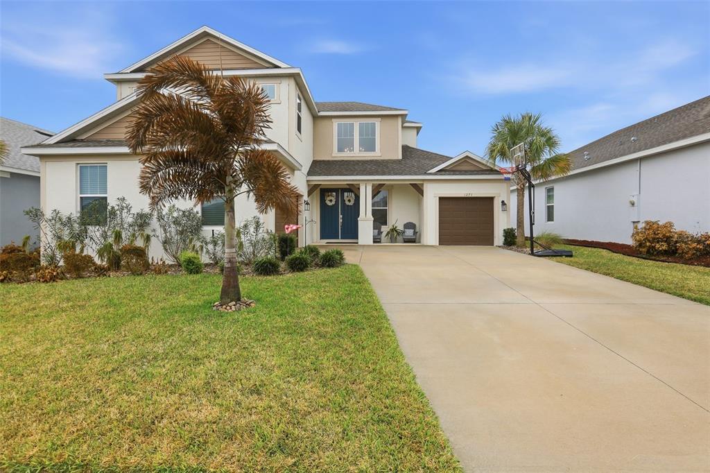 1271 Waterview Ridge Circle Apopka, FL 32703 - Photo 45 of 56 a front view of a house with a yard
