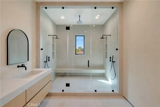 a view of a house with a backyard patio and swimming pool