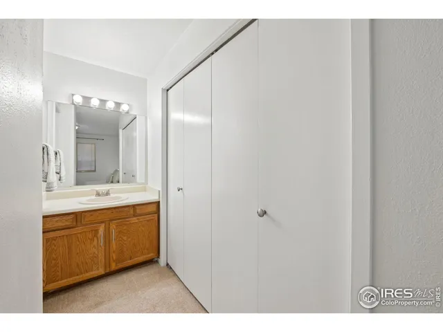 a bathroom with a sink a mirror and a bathtub