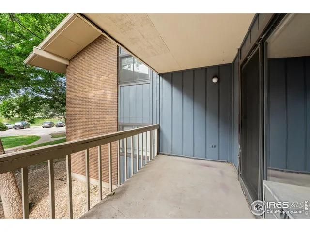 a balcony view with staircase