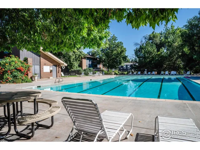 a view of a backyard and sitting area