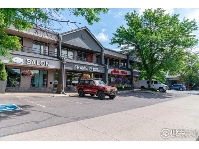 a car parked in front of a building