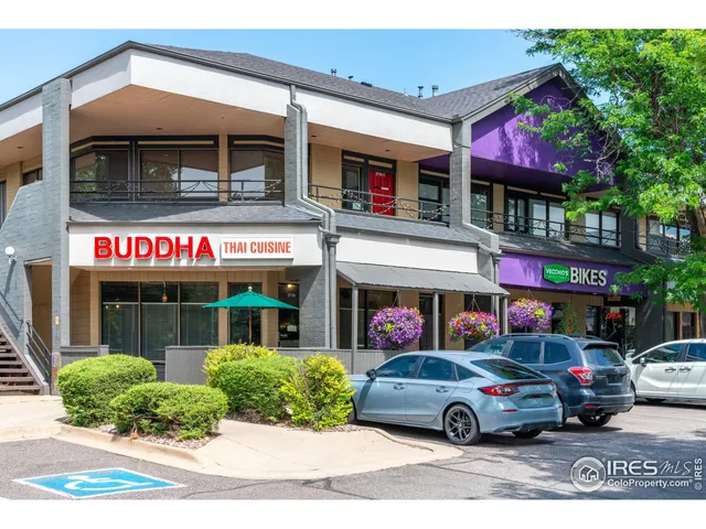 a view of street with shops