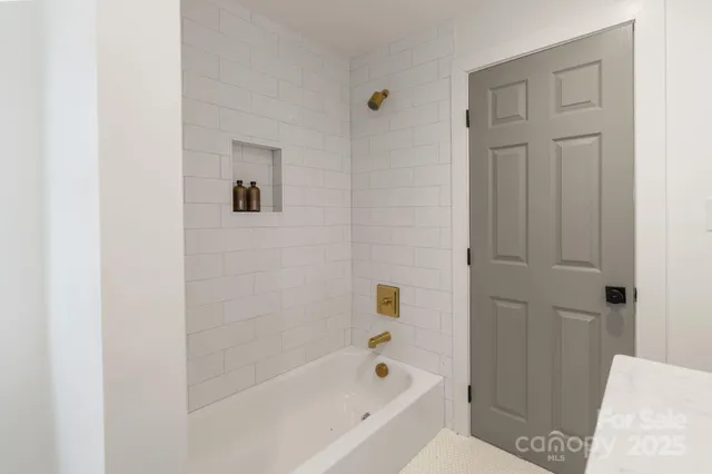 a bathroom with a bathtub