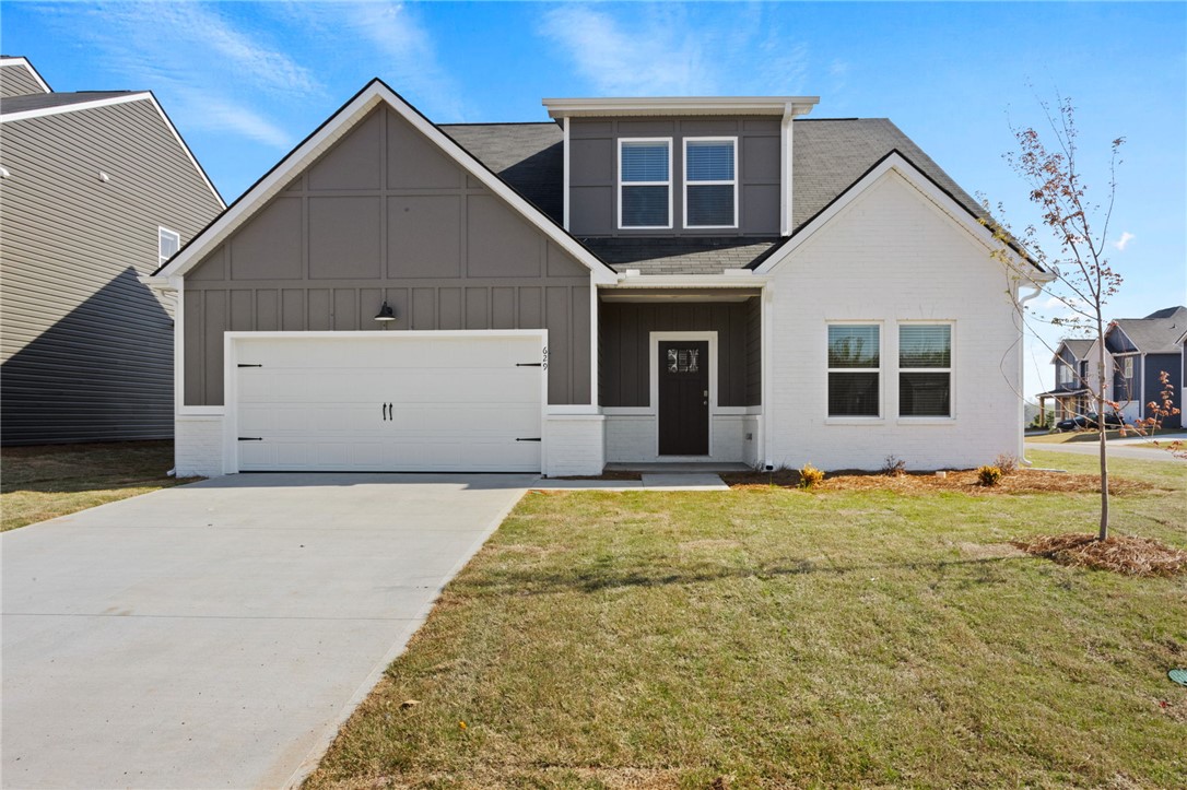 This modern home features a welcoming entryway and a well-maintained exterior.