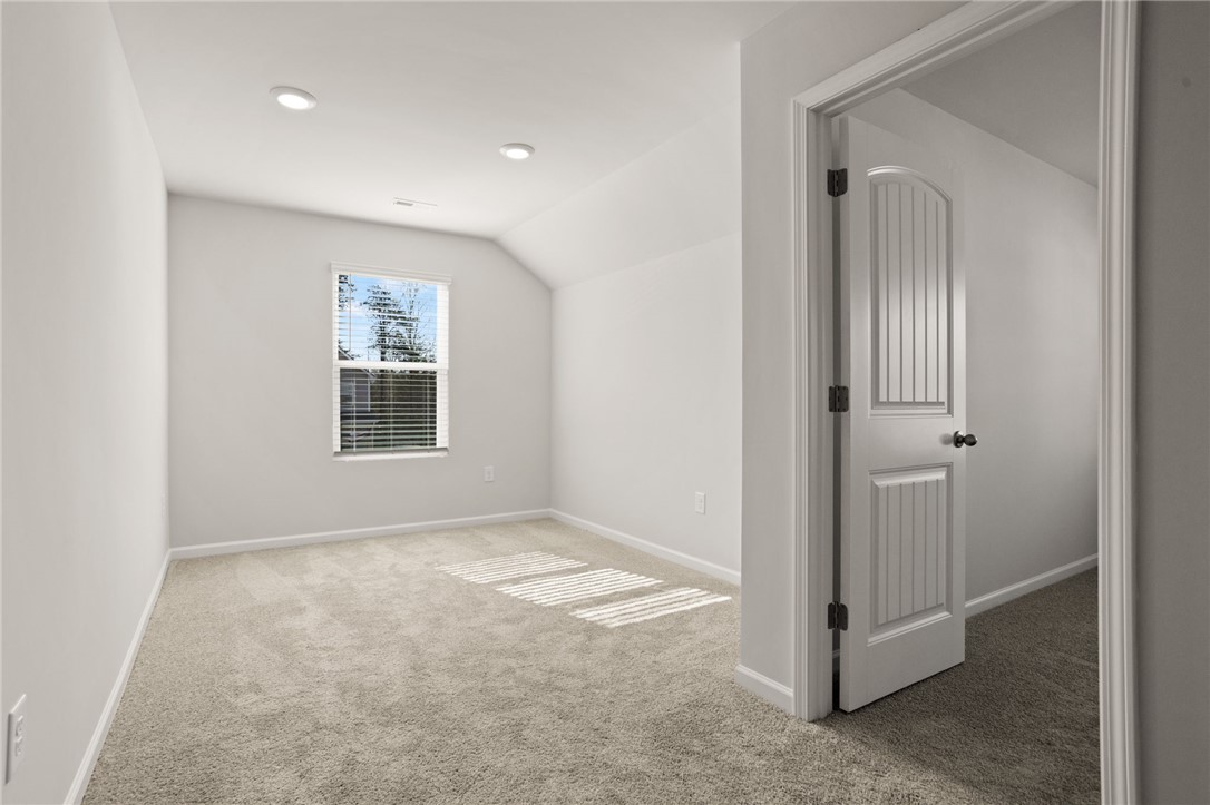 629 Silver Fir Street Piedmont, SC 29673 - Photo 23 of 36 This airy bedroom offers soft carpeting and natural light for comfortable living.