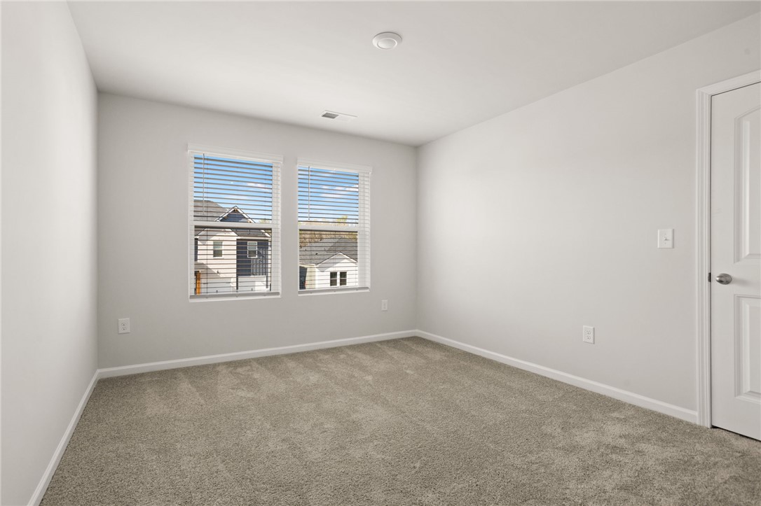 629 Silver Fir Street Piedmont, SC 29673 - Photo 25 of 36 This airy room offers a blank canvas for your design aspirations, bathed in natural light.