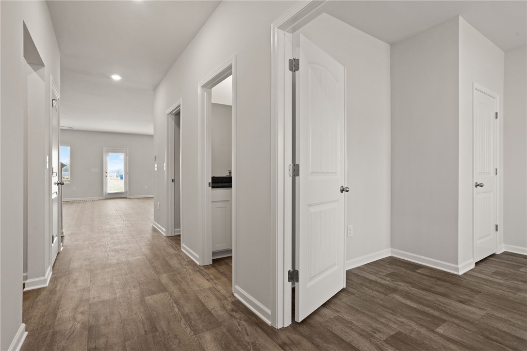 629 Silver Fir Street Piedmont, SC 29673 - Photo 5 of 36 This spacious interior hall boasts elegant flooring and bright recessed lighting.