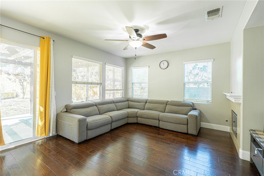 40601 Cebu Street Temecula, CA 92591 - Photo 14 of 26 a living room with furniture and a large window