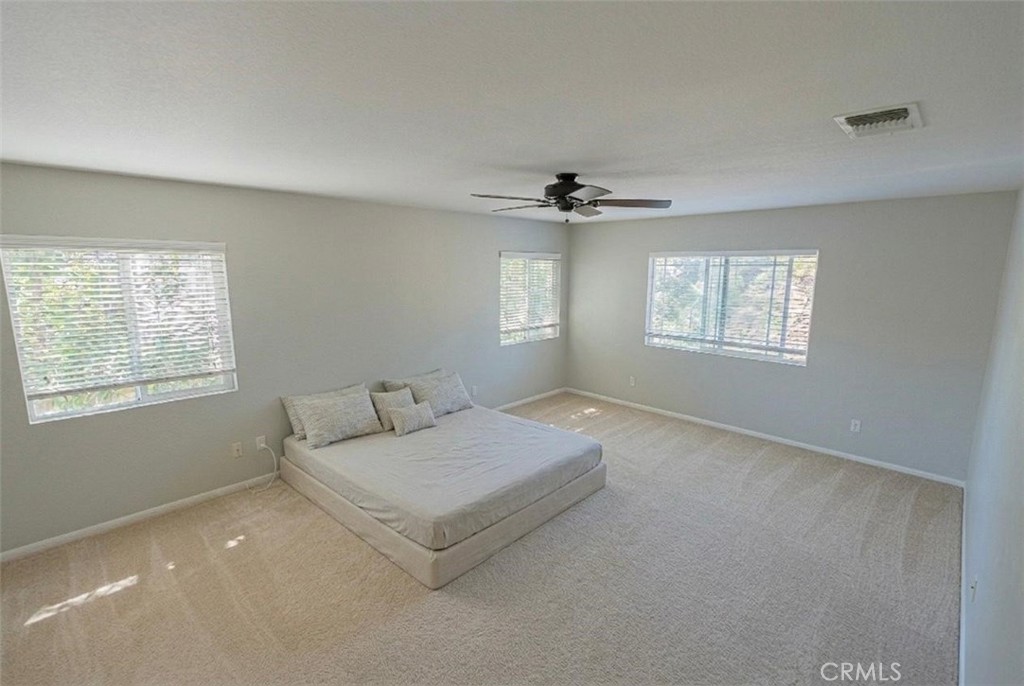 40601 Cebu Street Temecula, CA 92591 - Photo 15 of 26 a living room with furniture and windows