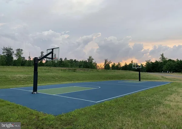 a view of a golf course with a lake