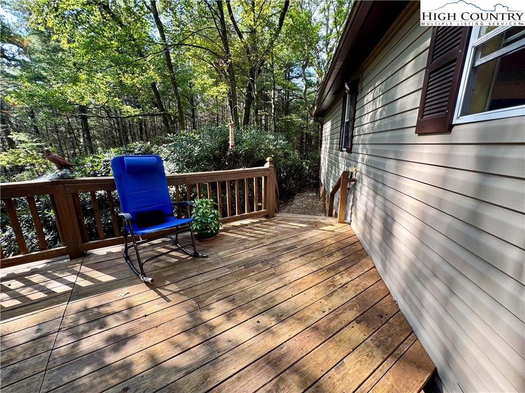 496 Laurelwood Lane Boone, NC 28607 - Photo 29 of 45 a view of a chairs and tables in the balcony