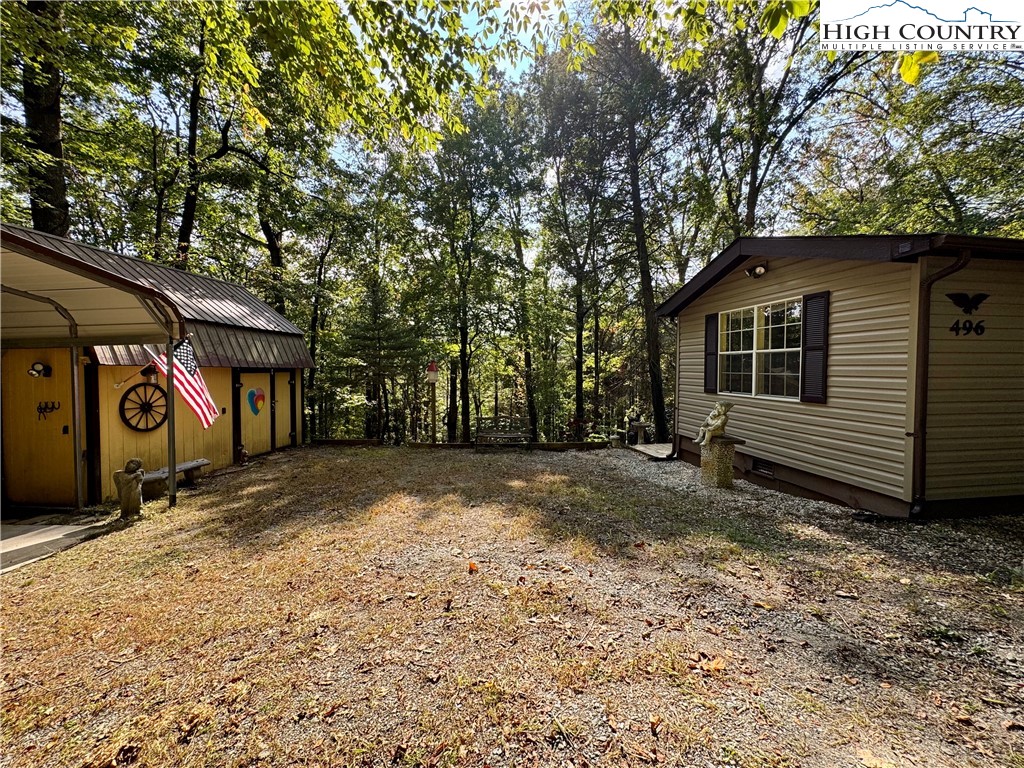 496 Laurelwood Lane Boone, NC 28607 - Photo 33 of 45 a view of a house with a yard