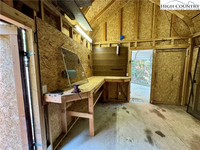 a yellow room with shower