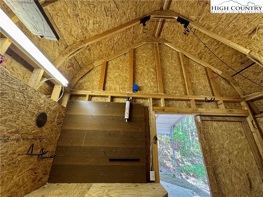496 Laurelwood Lane Boone, NC 28607 - Photo 40 of 45 a view of a balcony with wooden floor and door