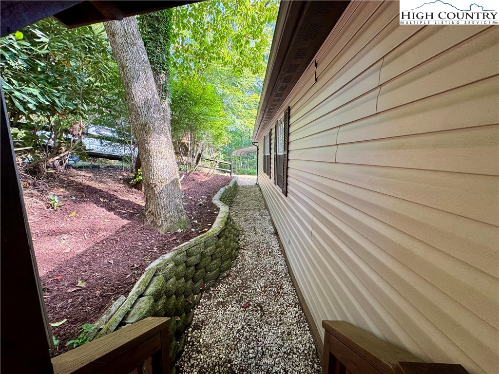 496 Laurelwood Lane Boone, NC 28607 - Photo 45 of 45 a view of a backyard with a large tree