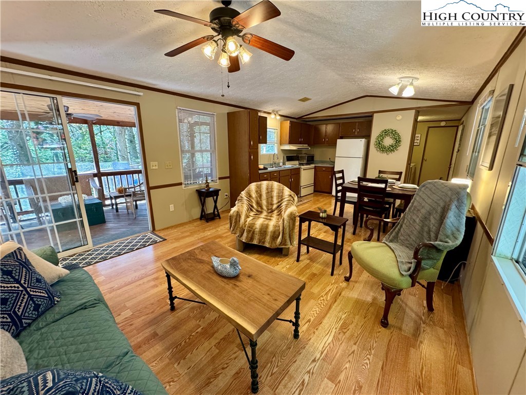 496 Laurelwood Lane Boone, NC 28607 - Photo 7 of 45 a living room with furniture and a large window