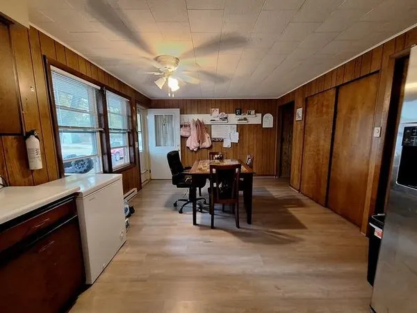 a kitchen with stainless steel appliances granite countertop a stove a sink dishwasher a refrigerator and a oven
