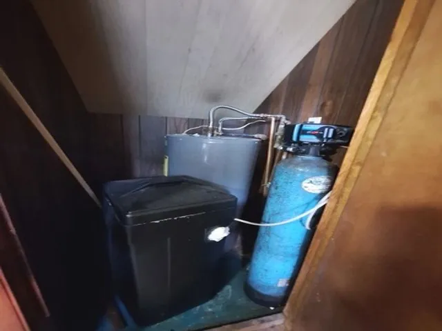 a view of hallway with wooden floor
