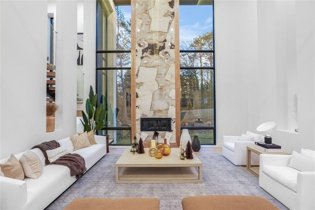 1736 Cox Road Roswell, GA 30075 - Photo 13 of 92 a living room with furniture and a large window