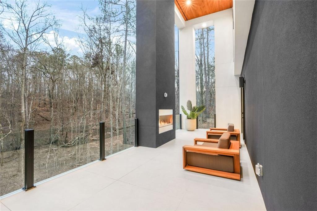 1736 Cox Road Roswell, GA 30075 - Photo 31 of 92 a bedroom with a bed and a window