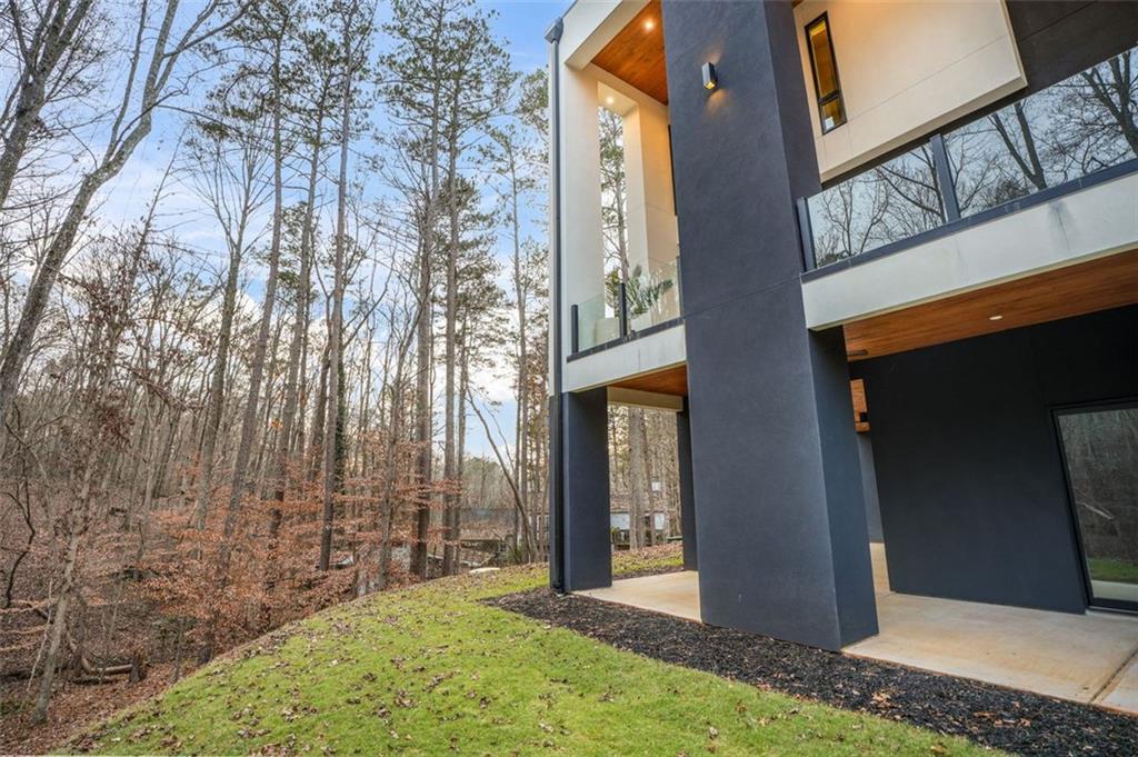 1736 Cox Road Roswell, GA 30075 - Photo 32 of 92 a view of a house with a door and wooden walls