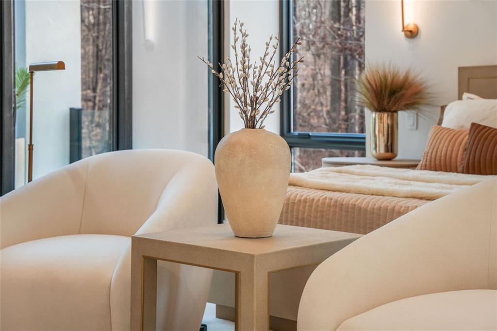 1736 Cox Road Roswell, GA 30075 - Photo 40 of 92 a living room with furniture and a potted plant