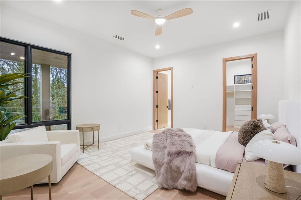 1736 Cox Road Roswell, GA 30075 - Photo 77 of 92 a living room with furniture and a large window