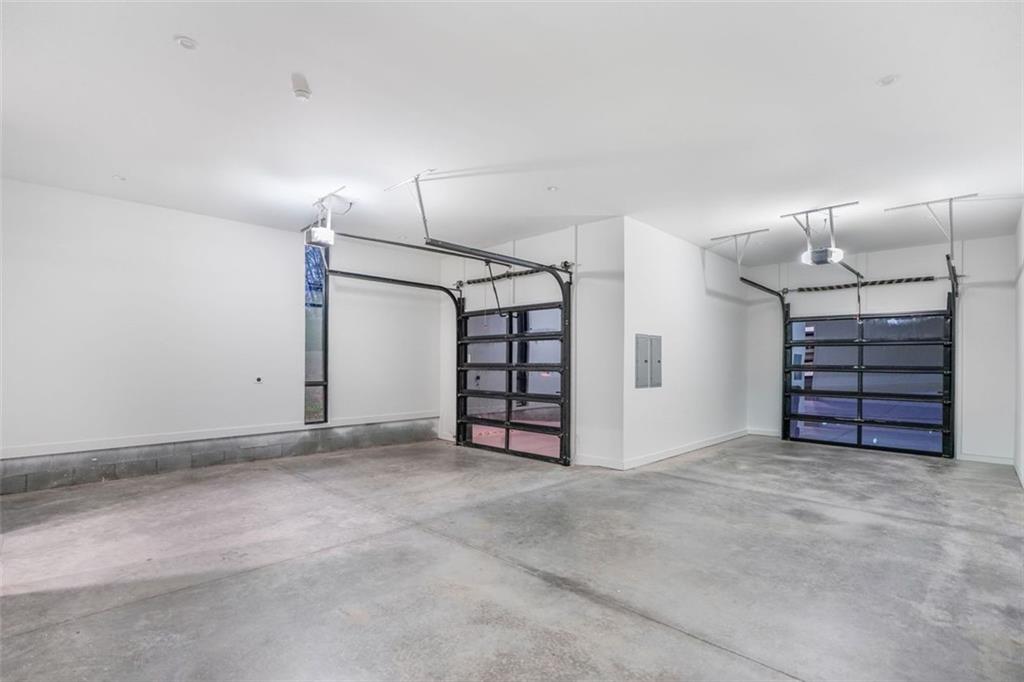 1736 Cox Road Roswell, GA 30075 - Photo 85 of 92 an empty room with a furniture and shower