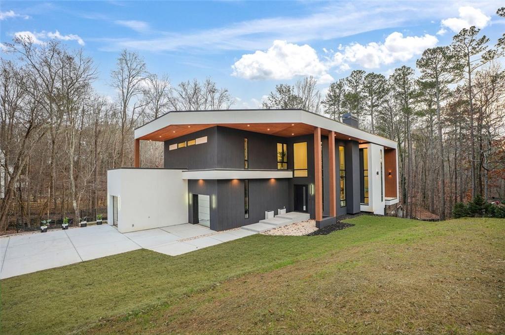 1736 Cox Road Roswell, GA 30075 - Photo 87 of 92 a front view of a house with garden