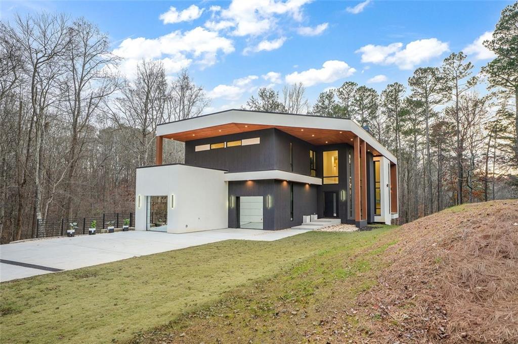 1736 Cox Road Roswell, GA 30075 - Photo 89 of 92 a front view of a house with a yard