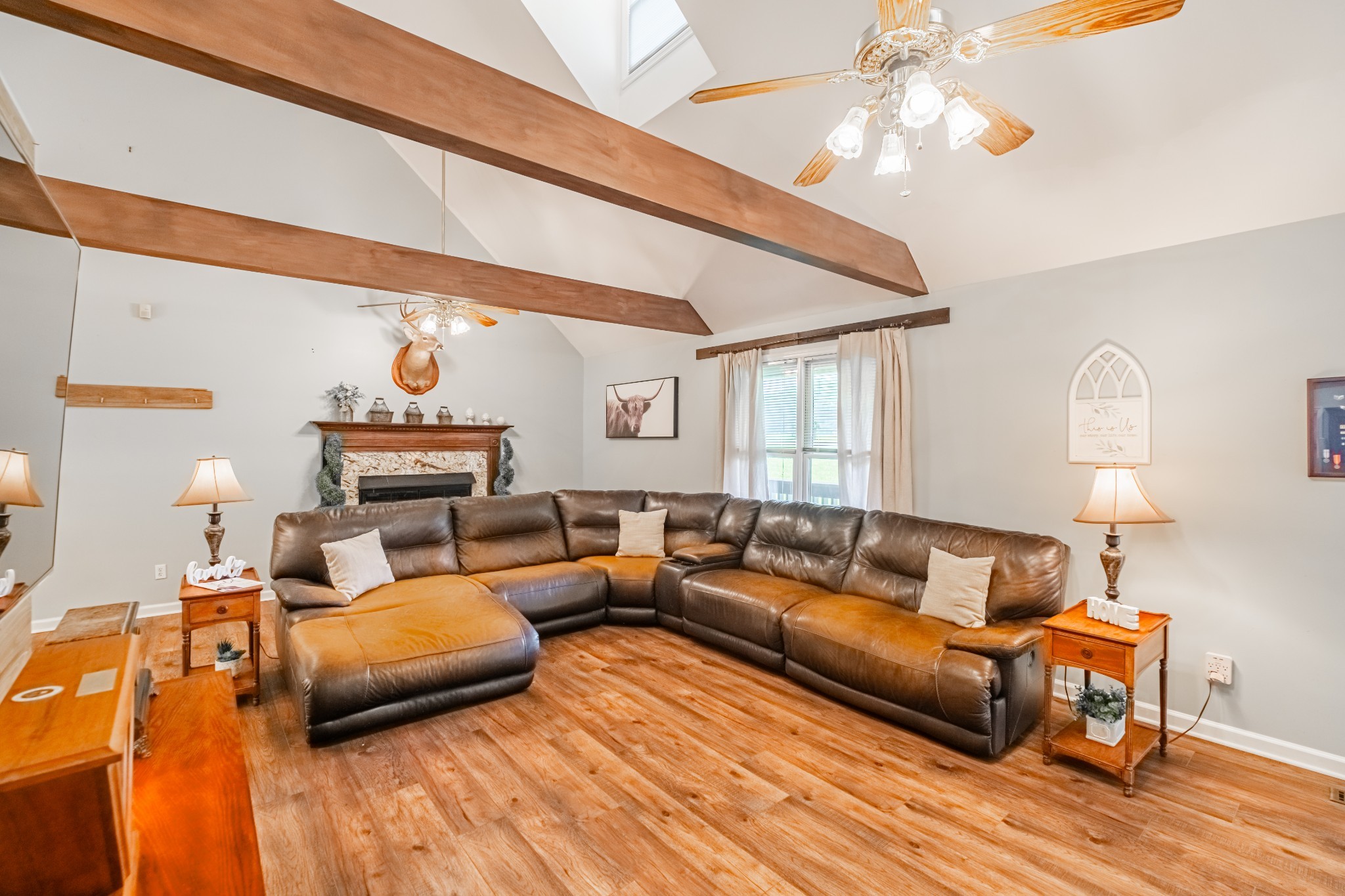255 Flora Lane Manchester, TN 37355 - Photo 11 of 53 a living room with furniture and a wooden floor