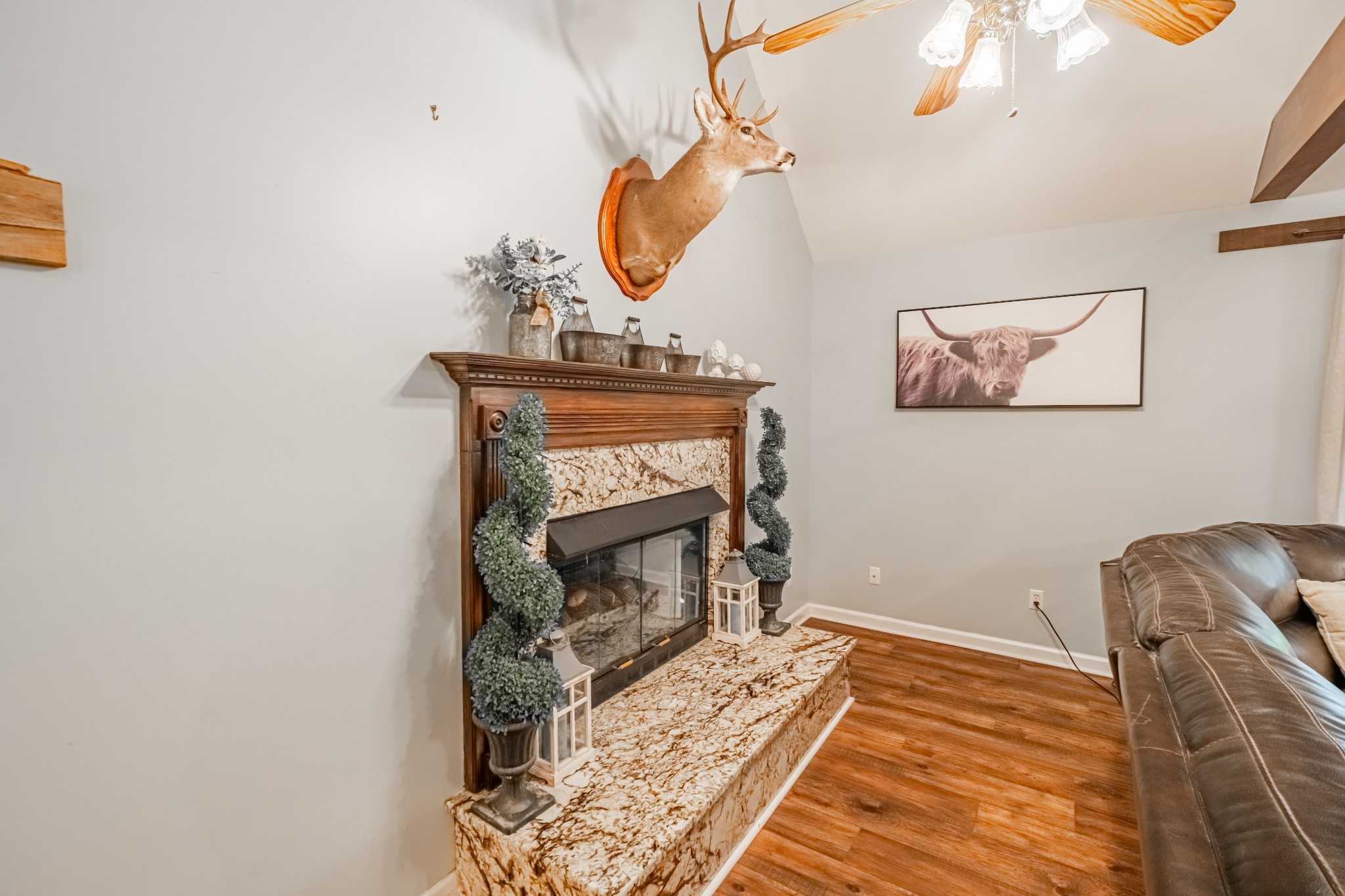 255 Flora Lane Manchester, TN 37355 - Photo 14 of 53 a bedroom with a bed and a fireplace