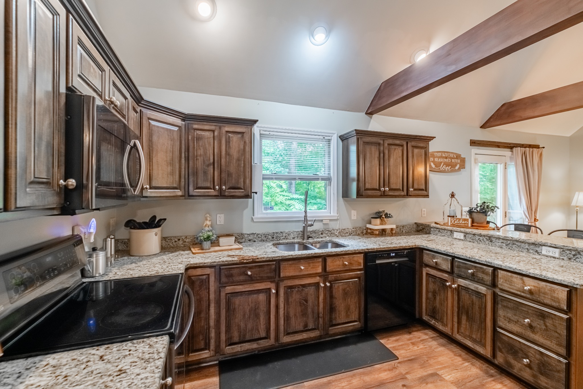 255 Flora Lane Manchester, TN 37355 - Photo 18 of 53 a kitchen with a sink a stove and cabinets